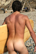 Hot hunk surfing in the nude