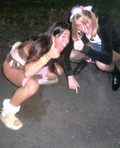 Cute girl in school uniform wanks her pussy and pisses