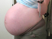 Horny  pregnant babe gets her tits fucked and so with her pussy