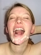 Hot chick is caught by surprise when she's jizzed on