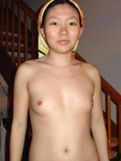 Cute and luscious asian chicks posing for the camera and showing boobs