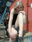 Sexy chick showing her feet with nylons