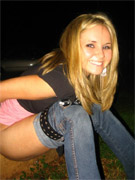 Young nude babe pissing with a cig in her hand