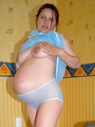 Pregnant jenny in a hot pink dress.