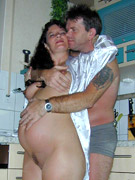 Brunette pregnant bitch swallows a big cock