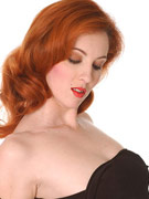 Harriet pinched both nipples and fucks a fat black dildo