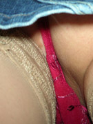 Nasty bimbo bends over in car and rubs clit with fingers