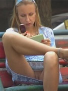 Hidden upskirt video of teen girl with fat lipped pussy