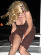 Real amateur upskirt with girl in red panty flashing pussy
