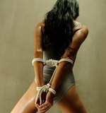 Asian girl in spandex body suit tied and bound