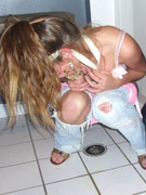 Nasty playful girl in stockings peeing near her car