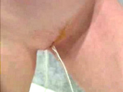 Two hot chicks stretch their hairless pussies and piss